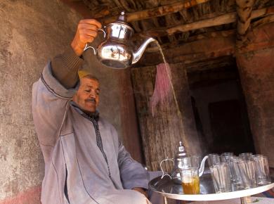  Berber man pouring tea, Atlas Mountains, Morocco